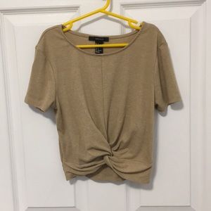 Cropped tan twisting t shirt